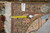 Corner turned back with tape measure and tag reading Rug No 60264, size 4' x 3'