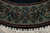 Straight-on border detail showing scrolling cartouches, guard bands and ivory skirt with square flower blocks
