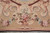 Border detail: a bouquet and cream acanthus scrolls on beige above the striped outer stripes