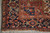 Corner detail with navy border, ivory minor stripe and red field meeting the fringe