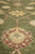 Low angle close-up of pile height with rose-brown palmette and yellow rosette above