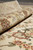 8'9" x 12' wool and silk pile shown in a rolled edge close-up
