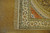 Corner detail with ivory fringe, coral corner panel and layered navy and gold guard stripes