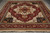 10 x 14 Indian hand-knotted wool rug shown flat with ivory corners and fringed ends