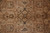 Close-up of the stepped center medallion with 8 petal rosette and dark brown outlines