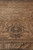 Low angle detail of camel pile and angular border motifs on this 1970s rug