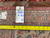 Back tag reading rug number Rx1315 with tape measure across the reverse knotted weave