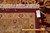 Back of rug with inventory tag reading 17'9" x 26'7" and a measuring tape for scale