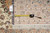 Back tag reading LA 53278 with tape measure confirming the 5'5" x 7'7" rug size