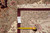 Back of the rug with inventory tag and tape measure documenting the fine hand-knotted weave