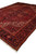 Three quarter view of the 1970s Persian Heriz rug showing full medallion and border layout