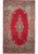 13' x 21' Persian Kerman rug shown flat from above with open red field and ivory border