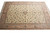 5'2" x 7'8" Isfahan rug laid flat, small central rosette anchoring symmetrical vine scrollwork