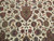 Ivory field detail showing songbirds, leaping deer and palmette flowers in silk highlighted wool pile
