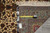 Back of the 5'10" x 9'8" Tabriz with tape measure and hand-woven Oriental tag