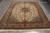 Angled floor view of ivory 8x10 Persian Tabriz rug with taupe brown main border