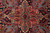 Detailed shot of salmon and slate blue stepped center medallion with 8 palmette arms