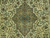 Close-up of the slate blue and sage lobed medallion framed by cream ground and salmon blossoms