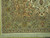 Corner detail showing salmon spandrel, sage main border, guard stripes and hand-tied ivory fringe