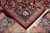 Folded corner showing the even weave on the back and dense wool and silk pile