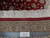 Ruler across the back showing knot density and pure silk pile of 8x11 Qum rug