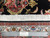 Ruler against fringe end of 400 knots per square inch authentic hand knotted Persian rug