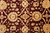 Detail of vine lattice with gold rosettes and pale blue accents over deep burgundy ground