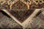 Folded corner revealing dense pile, tight 400 knots per square inch weave and ivory fringe