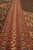 Border detail running lengthwise with rust, sky blue and ivory floral guard stripes