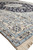 Angled 8'1 x 11'4 Nain rug corner showing layered borders and ivory spandrel drawing