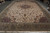 Oversize 13x20 Kashan rug laid flat showing medallion, corner spandrels and wide floral border