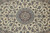 Close-up of the layered blue and ivory star medallion ringed with palmettes and curling vines