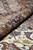 Rolled edge of the 5x7 Isfahan rug showing velvety wool and silk border pile