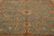 Detail of all-over Ziegler floral pattern with gold palmettes and vines across sage field