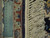 Ruler laid across border showing fine knot density and silk highlights in unused pile