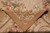 Folded corner revealing the flat woven back and smooth tapestry weave structure of the rug
