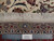 Tabriz rug back and fringe with ruler confirming approximately 400 knots per square inch density