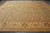 Oversize 14x16 Chobi Peshawar rug photographed flat showing sage field and wide honey gold border