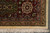 Burgundy main border corner with ivory palmette cartouche, olive green vines and cream cotton fringe