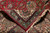 Folded corner revealing tight knotting on the back of this semi-antique Persian Tabriz rug