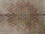 Wool and silk pile close-up revealing silk sheen across the star medallion and field