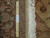 Back of 8'2" x 10'3" Persian Heriz rug with ruler measuring knots per square inch