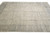 Wide sage gray border with ivory palmettes seen along the length of this large wool rug