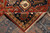 Folded 10' x 10' Indian wool rug revealing even knotting across the reverse side