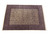 Large 10x15 Persian rug displayed flat on a white studio floor at an angle