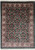 Full view of 8'8" x 11'8" emerald green William Morris Jaipur rug with ivory border