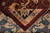 Folded corner revealing the back of the rug and its even hand-knotted weave