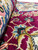 Rolled edge macro showing dense wool and silk pile, plush hand feel and silky sheen