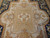 Detailed center medallion with crown, shield and foliage in gold, ivory and pale grey blue