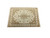 9x12 hand-knotted Tabriz design rug photographed at an angle showing ivory borders and floral spandrels
